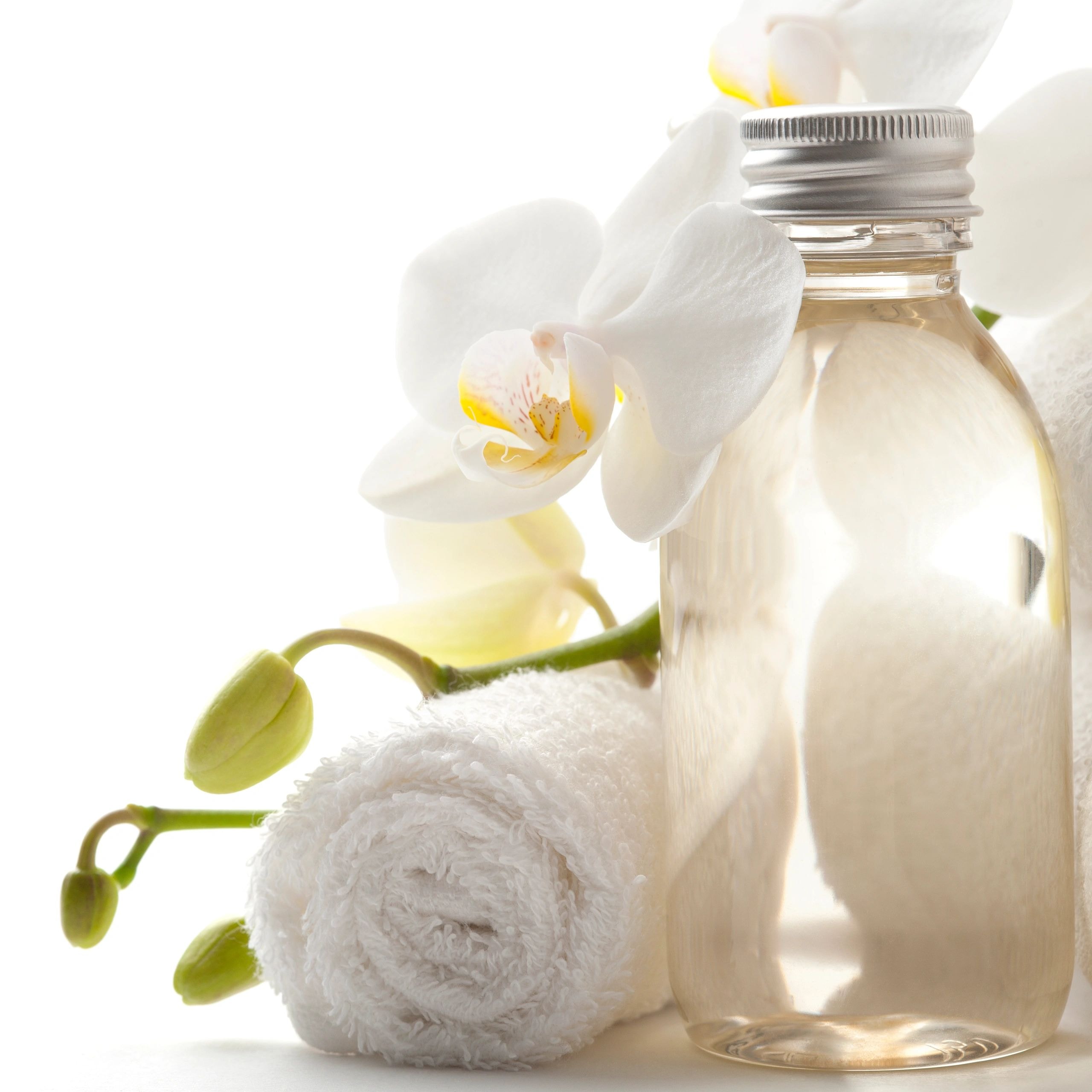 Spa wellness essential oil bottle with orchid